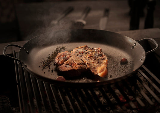 Tramontina Churrasco Black 40 cm Round Griddle Pan in Nitrocarburized Carbon Steel