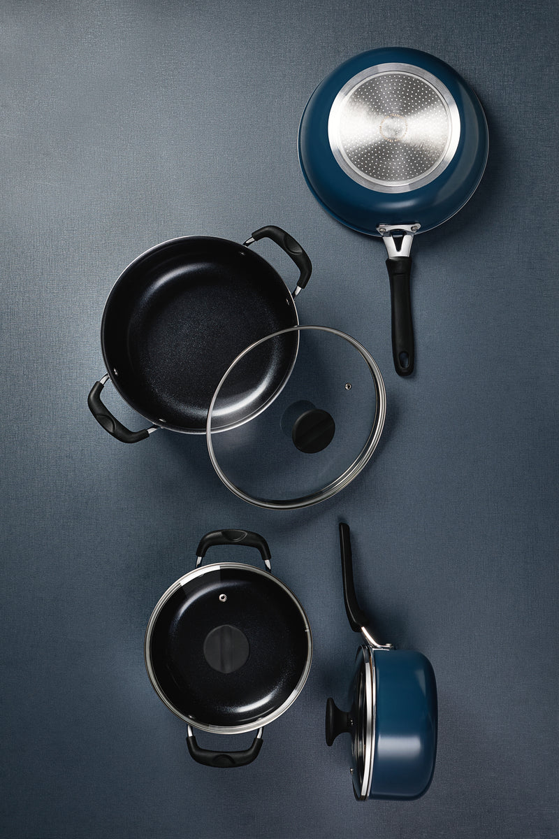 Load image into Gallery viewer, Tramontina Tunis 4-Piece Aluminum Cookware Set with Ceramic Internal Coating and Mediterranean Blue Silicone Exterior
